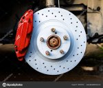 depositphotos_160352320-stock-photo-red-brake-caliper-and-disk.jpg